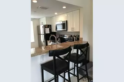 1040 Lake Shore Drive #105, Lake Park, FL 33403 - Photo 4