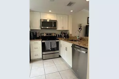 1040 Lake Shore Drive #105, Lake Park, FL 33403 - Photo 2