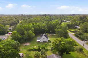 16317 Glasgow Dr E, The Acreage, FL 33470 - Photo 10