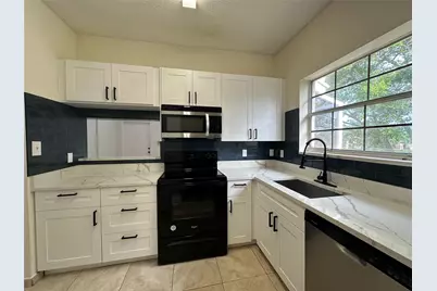 641 Cypress Lake Boulevard #K18, Pompano Beach, FL 33064 - Photo 12