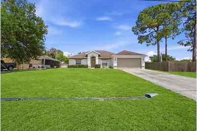1293 SW Kalevala Drive, Port Saint Lucie, FL 34953 - Photo 1