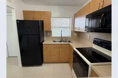 9660 Sunrise Lakes Boulevard #306, Sunrise, FL 33322 - Photo 6