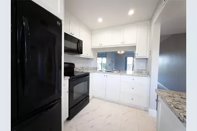 10332 Sunrise Lakes Boulevard #310, Sunrise, FL 33322 - Photo 8