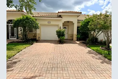 9766 Galleon Drive, West Palm Beach, FL 33411 - Photo 1