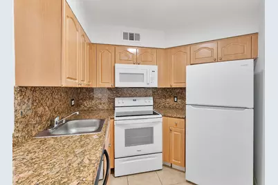 212 Lake Pointe Drive #302, Oakland Park, FL 33309 - Photo 10