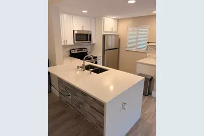 111 Gardens Drive #102, Pompano Beach, FL 33069 - Photo 1