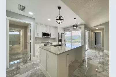 6503 Geminata Oak Court, Palm Beach Gardens, FL 33410 - Photo 1