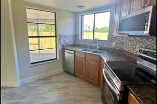 1275 McDermott Ln, Royal Palm Beach, FL 33411 - Photo 6