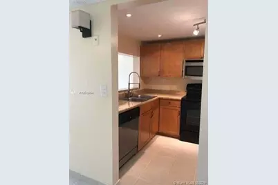 1911 Sabal Palm Drive #104, Davie, FL 33324 - Photo 2