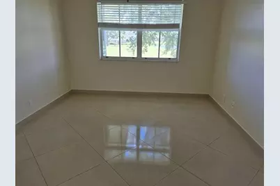 2823 N Course Drive #205, Pompano Beach, FL 33069 - Photo 8