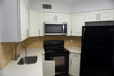 213 Lake Pointe Drive #211, Oakland Park, FL 33309 - Photo 6