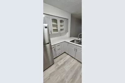 118 Lake Emerald Drive #107, Oakland Park, FL 33309 - Photo 4