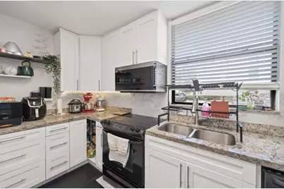 8421 Forest Hills Drive #104, Coral Springs, FL 33065 - Photo 4