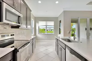 15684 Goldfinch Cir, The Acreage, FL 33470 - Photo 8