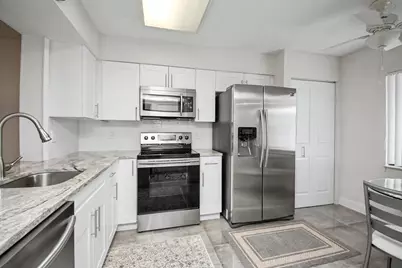 7351 Kinghurst Drive #301, Delray Beach, FL 33446 - Photo 2