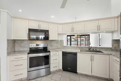 7792 Lexington Club Boulevard #B, Delray Beach, FL 33446 - Photo 18