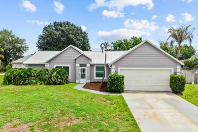 697 SW Jeanne Avenue, Port Saint Lucie, FL 34953 - Photo 1
