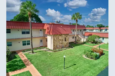 12021 W Greenway Drive #105, Royal Palm Beach, FL 33411 - Photo 1