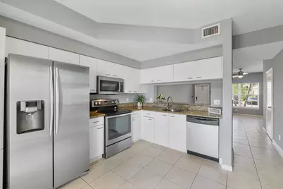 9905 NW 57th Manor, Coral Springs, FL 33076 - Photo 24