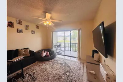 8025 S Colony Circle #203, Tamarac, FL 33321 - Photo 2