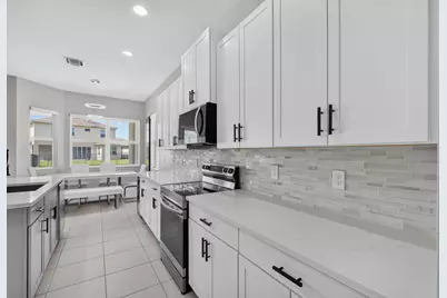 16293 Melogold Drive, The Acreage, FL 33470 - Photo 24