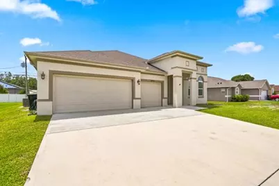 1957 SW Logan Street, Port Saint Lucie, FL 34953 - Photo 1