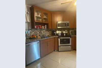 3 Greenway Village N #202, Royal Palm Beach, FL 33411 - Photo 1
