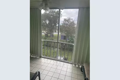 1025 Country Club Drive #302, Margate, FL 33063 - Photo 12