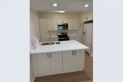9150 NW 38th Drive #111, Coral Springs, FL 33065 - Photo 1