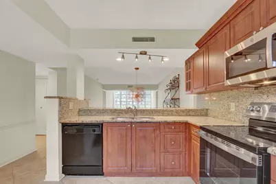 3636 Whitehall Drive #105, West Palm Beach, FL 33401 - Photo 1