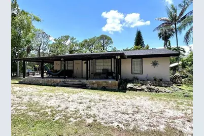 16887 W Trafalgar Drive W, The Acreage, FL 33470 - Photo 1