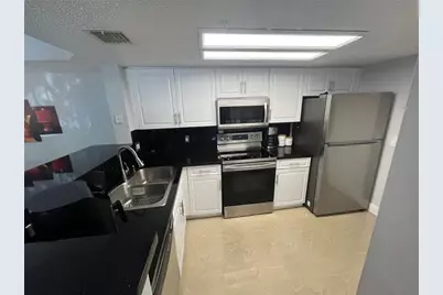 5051 Wiles Road #207, Coconut Creek, FL 33073 - Photo 6