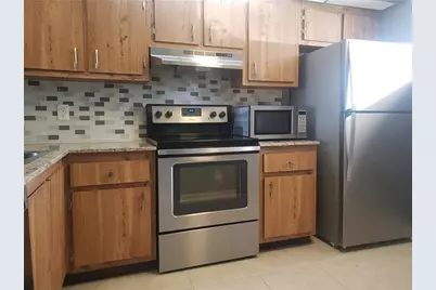 109 Lake Emerald Drive #107, Oakland Park, FL 33309 - Photo 2