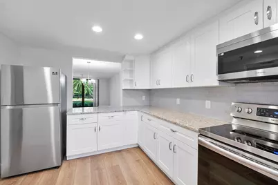 2400 Deer Creek Country Club Boulevard #102-1, Deerfield Beach, FL 33442 - Photo 2