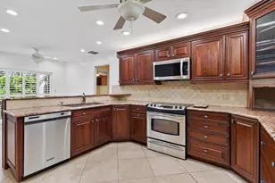 11453 Shady Oaks Ln, North Palm Beach, FL 33408 - Photo 18