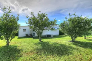 912 Oriole Cir, Barefoot Bay, FL 32976 - Photo 2