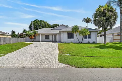 1061 SW Benschop Avenue, Port Saint Lucie, FL 34953 - Photo 1