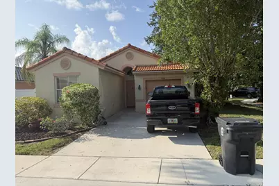 8164 Pelican Harbour Drive, Lake Worth, FL 33467 - Photo 1