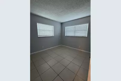 9915 Sandalfoot Boulevard #410, Boca Raton, FL 33428 - Photo 20