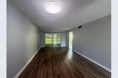 9915 Sandalfoot Boulevard #410, Boca Raton, FL 33428 - Photo 20