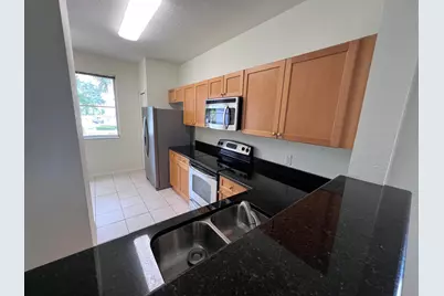 11037 Legacy Boulevard #204, Palm Beach Gardens, FL 33410 - Photo 2