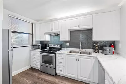 8437 Forest Hills Drive #203, Coral Springs, FL 33065 - Photo 4