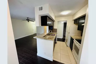 5686 Rock Island Road #115, Tamarac, FL 33319 - Photo 2
