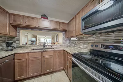 7650 Tahiti Lane #105, Lake Worth, FL 33467 - Photo 10