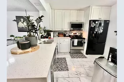 8301 Sands Point Boulevard #S306, Tamarac, FL 33321 - Photo 6