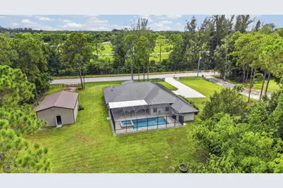 17377 W Alan Black Boulevard, The Acreage, FL 33470 - Photo 50