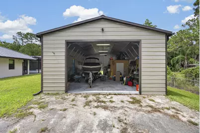 17377 W Alan Black Boulevard, The Acreage, FL 33470 - Photo 54