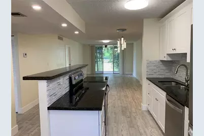 250 Jacaranda Drive #203, Plantation, FL 33324 - Photo 1