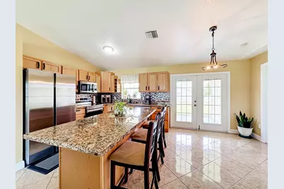 1402 SW Flounder Lane, Port Saint Lucie, FL 34953 - Photo 8