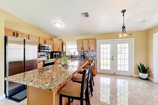 1402 SW Flounder Ln, Port Saint Lucie, FL 34953 - Photo 8